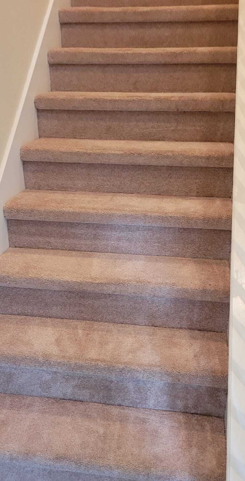 Staircase with wine spills after cleaning